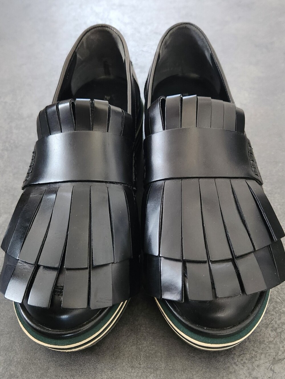 Paloma Barceló Black Leather Kiltie Fringe Platform Loafers Green Cream Stripe